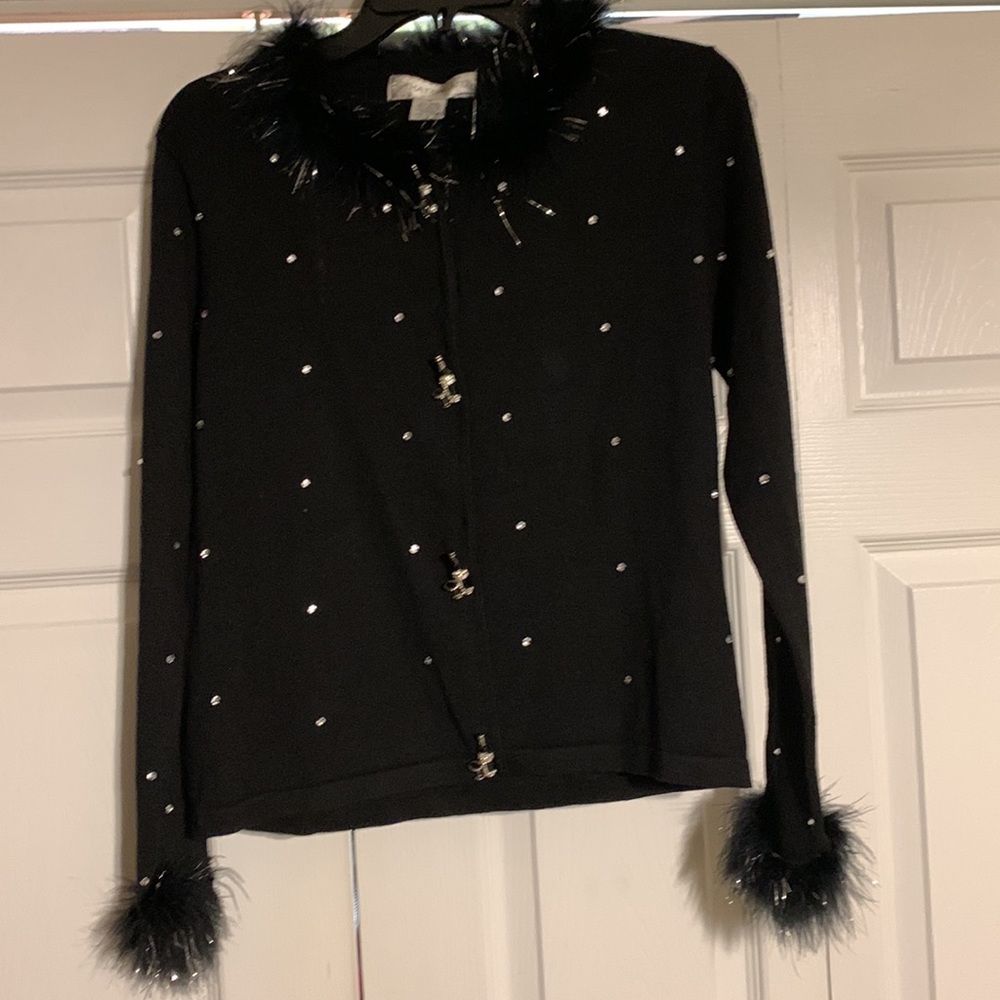 Black M Sweater with sliver and black furry neck and wrist.